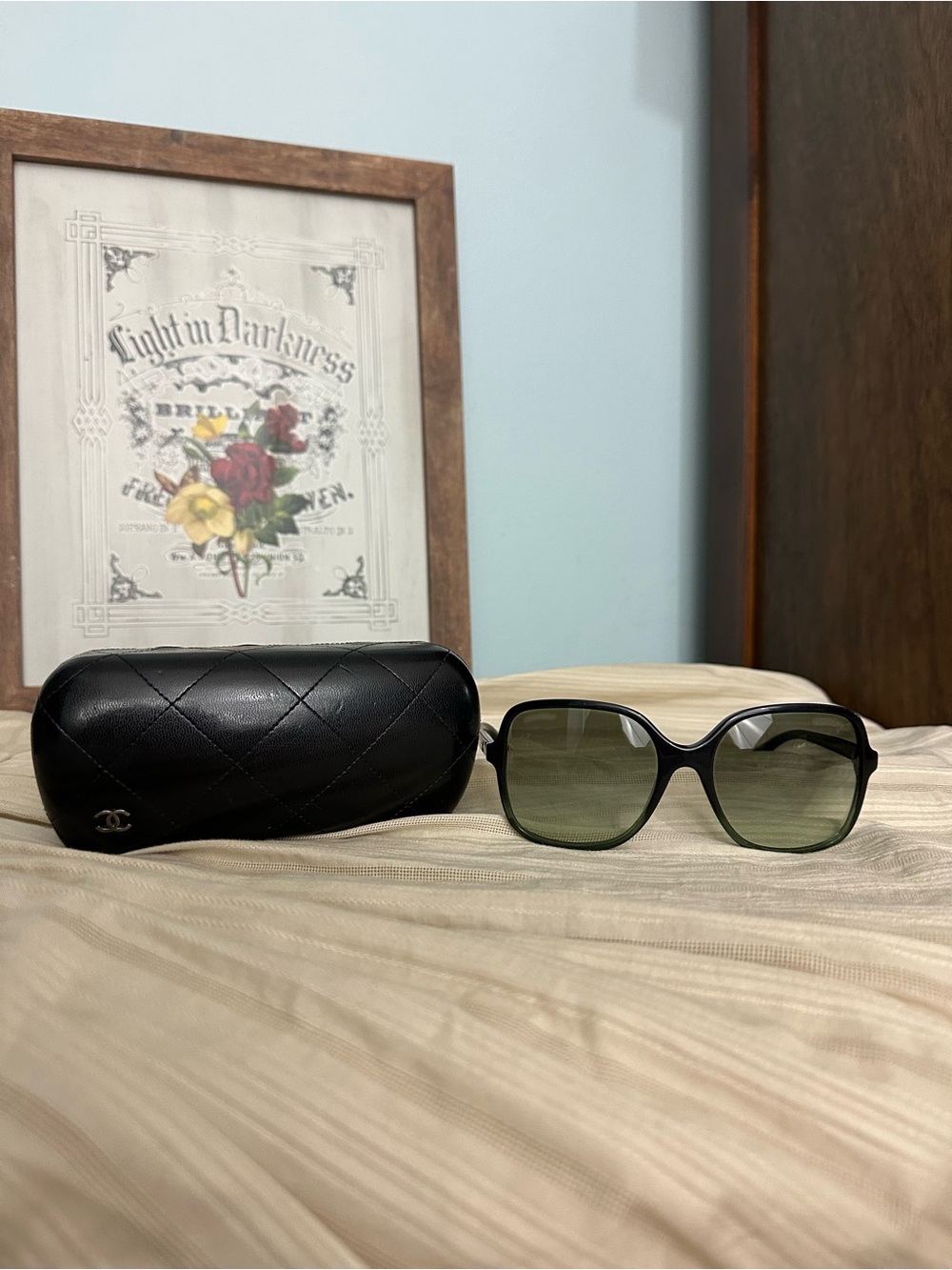 CHANEL Black Frame Sunglasses with Green Gradient Lenses